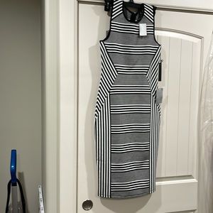 Felicity and Coco dress never worn still with the tags.